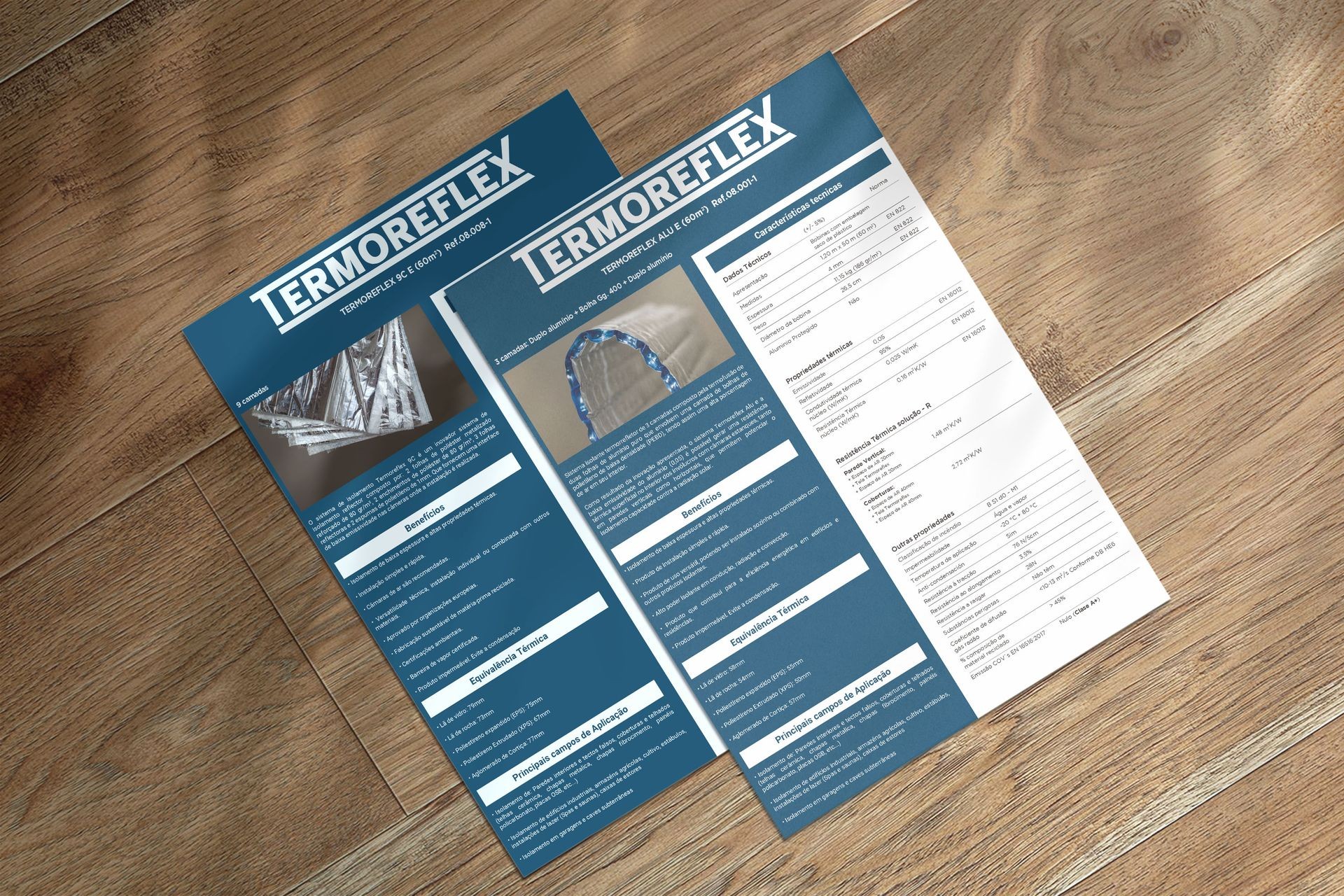 Fichas técnicas Isolamento Térmico sobre uma mesa de madeira